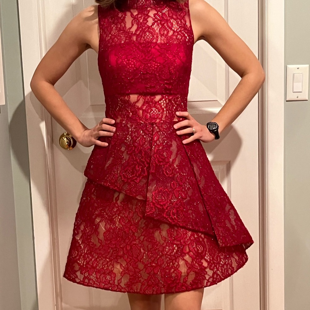 Stunning lace dress with peekaboo area